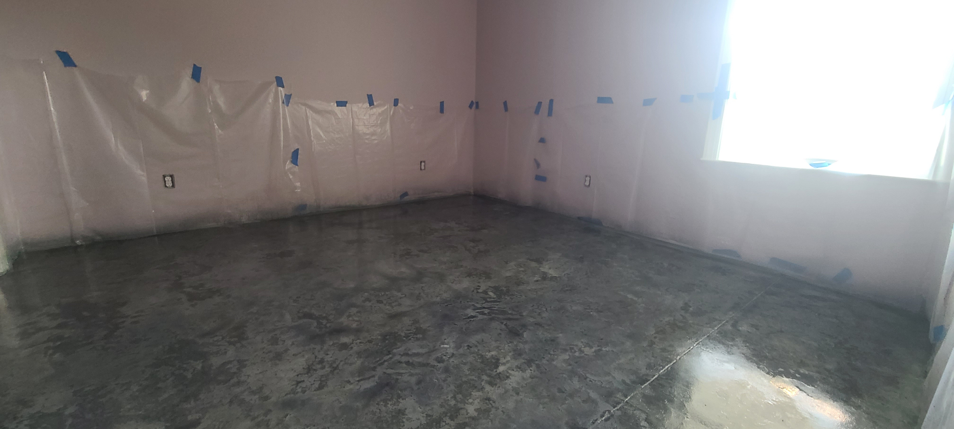 Professional concrete contractor team pouring on job site